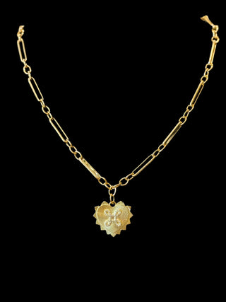 Gold mixed paperclip link chain with a heart pendant 
